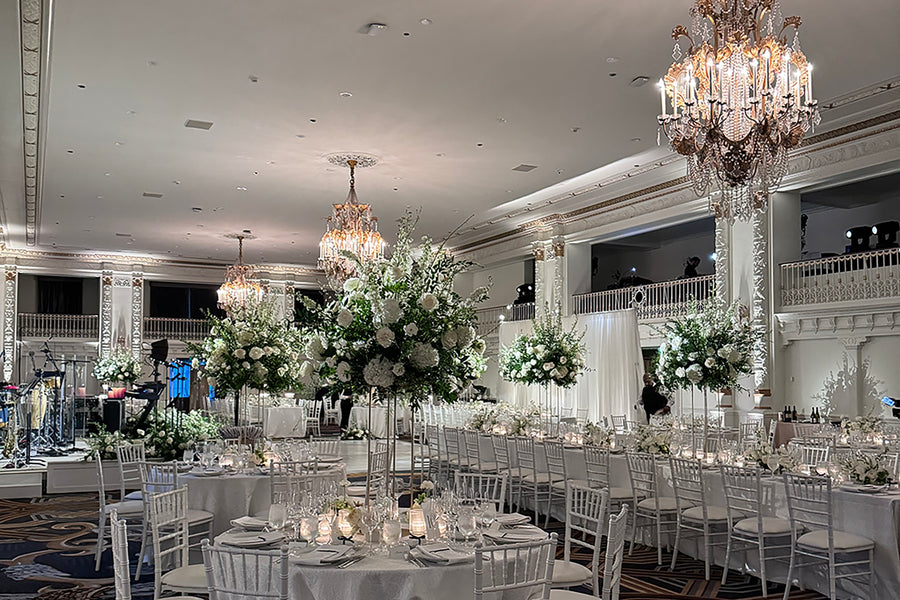Spanish Ballroom Wedding Lighting with Large Floral Arrangements and Pin-Spots at Fairmont Olympic Hotel Seattle